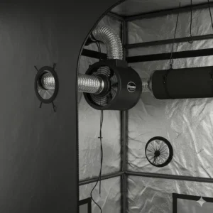 Close-up of the upper corner of the 5x5 grow tent highlighting the duct ports and the placement of the inline fan and filter system.