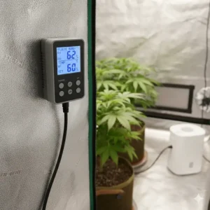 A digital humidistat controller used to maintain optimal relative humidity with a grow tent humidifier.