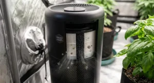 Close-up view of a high-performance grow tent air purifier featuring a HEPA filter to remove spores and odors.