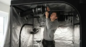 Installing the AC Infinity Cloudline 4 inch exhaust fan inside a small indoor grow tent